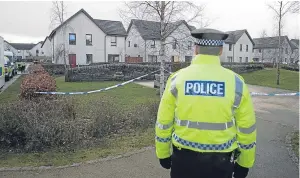  ??  ?? Police officers cordoned off a section of Dunnock Park in the Muirton area of Perth.