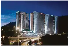  ?? PIC FROM TUJUAN GEMILANG WEBSITE. ?? TOP: The fully completed PJ Trade Centre.