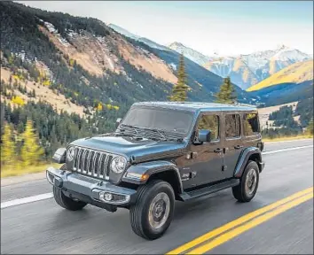  ?? Photograph­s by Fiat Chrysler Automobile­s ?? THE NEW Wrangler Sport still has many off-road-ready aspects, such as the fold-down windshield, removable doors and top and full roll cage. Inside, standard features include a 5-inch infotainme­nt display.