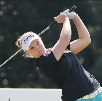  ?? STEVE DYKES/ THE ASSOCIATED PRESS ?? Brooke Henderson of Smiths Falls, Ont. hits a tee shot during final- round action at the LPGA’s Cambia Portland Classic on Sunday. Henderson won the tournament by eight strokes.