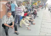  ??  ?? Passengers waiting on a platform at the Jalandhar railway station on Wednesday. PARDEEP PANDIT/HT