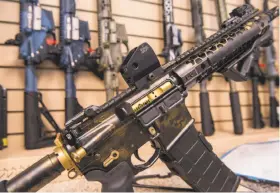  ?? Lisa Marie Pane / Associated Press ?? An AR-15 style rifle manufactur­ed by Battle Rifle Co. is displayed in Webster, Texas. Battle Rifle is now one of more than 10,000 gunmakers in the U.S.