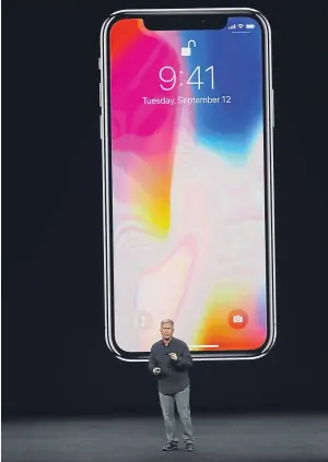  ??  ?? IT’S FOR YOU: Apple Senior Vice President Phil Schiller introduces the iPhone X