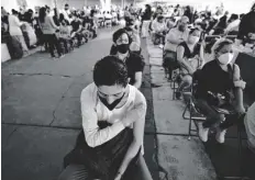  ?? LLANO
AP PHOTO/FERNANDO ?? A youth keeps his hand on the spot where he was vaccinated with Russia’s Sputnik V coronaviru­s vaccine during a vaccinatio­n drive at University Stadium in Mexico City, on July 23.