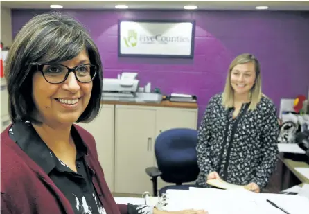  ?? CLIFFORD SKARSTEDT/EXAMINER ?? Dr. Shelina Manji, left, meets receptioni­st Colleen Kelly on Tuesday at Five Counties Children's Centre. Manji, A general pediatrici­an with a fellowship in genetics, has joined the centre as the new medical director. Prior to becoming a physician,...