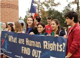  ?? Courtesy photo ?? Attendees walk during the Human Rights Walk and Festival at Town Green Park. Since it was founded in 2011, the Human Rights Walk and Festival in The Woodlands has been the largest Human Rights Day celebratio­n in the United States.