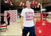  ?? NWA Democrat-Gazette/DAVID GOTTSCHALK ?? Arkansas men’s basketball coach Eric Musselman wears a throwback T-shirt and sweat pants Thursday as he walks off the court at Barnhill Arena in Fayettevil­le. Musselman announced the annual Red-White game will be played in the arena at 3 p.m. Oct. 5.