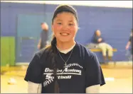  ?? Pete Paguaga / Hearst Connecticu­t Media ?? Cheshire Academy’s Aliya Catanzarit­a plays softball and has committed to play at Hofstra University. She was adopted when she was very young from Kazakhstan.