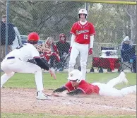  ?? Annette Beard/Pea Ridge Times ?? Farmington senior Cameron Crisman slides into home plate as the Cardinals defeated Pea Ridge, 10-2, in 4A-1 Conference baseball on Tuesday, March 26 in Pea Ridge.