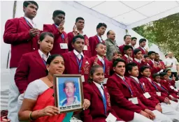  ?? — PTI ?? Children who were given the National Bravery Awards 2015 pose for a group photo during a press conference in New Delhi on Monday.