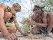  ??  ?? San bushmen demonstrat­e skills that would go down well at a barbecue, above; horse riding on the pans at Camp Kalahari, middle