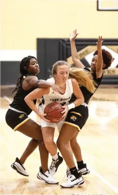  ?? Staff photo by Kelsi Brinkmeyer­s ?? Pleasant Grove player Autumn Crouch dribbles the ball as a Mount Pleasant player attemots to block her durnig their game Tuesday at Pleasant Grove.