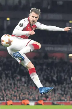  ?? Picture: Getty. ?? Aaron Ramsey scores his second goal in Arsenal’s 4-1 win over CSKA Moscow at the Emirates Stadium.