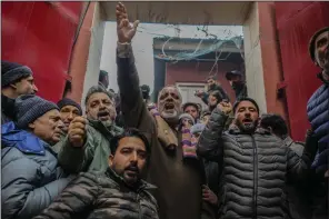  ?? (AP/Mukhtar Khan) ?? Supporters of the Jammu Kashmir National Conference shout slogans during a protest in Srinagar, Indian-controlled Kashmir, on Saturday.