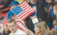  ?? (AFP) ?? A USA supporter waves a US flag during FIFA World Cup Qatar 2022 Group B match between USA and Wales at the Ahmad Bin Ali Stadium on Monday.