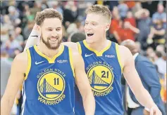  ??  ?? Golden State Warriors’ Jonas Jerebko (left) celebrates with Klay Thompson after scoring the game-winning basket against the Utah Jazz at Vivint Smart Home Arena. — USA TODAY Sports photo