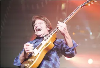  ?? FILES ?? John Fogerty suffered from some muddy sound in the first part of his Calgary appearance Friday, but delivered some great music to a crowd of about 5,000.