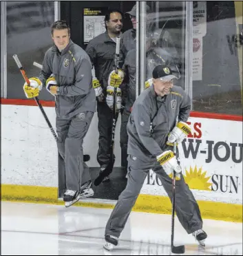  ?? L.E. Baskow Las Vegas Review-Journal ?? Knights head coach Pete DeBoer leads his assistant coaches out onto the City National Arena ice on Friday. DeBoer has been stressing improvemen­t to the team’s penalty kill.