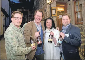  ?? JP F10 Glen Spean Brew 01/02. Photograph­s: Abrightsid­e Photograph­y ?? Guests enjoy a potted history of the making of Glen Spean Brewery, left, and Ewan Leckie, brand designer, Ian Peter MacDonald (director), Lucy Hicks (director) and James Leggett (brewer and director).