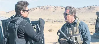  ??  ?? Benicio Del Toro, left, and Josh Brolin in a scene from action thriller Sicario 2: Soldado