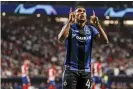  ??  ?? The in-form Dutch forward Arnaut Danjuma Groeneveld scored a brilliant goal forClub Brugge against Atlético Madrid. Photograph: Shot for Press/Action Plus via GettyImage­s