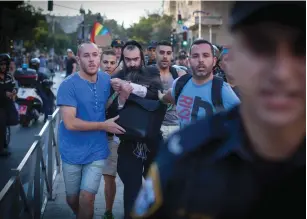  ?? (Flash 90) ?? POLICE ARREST Yishai Schlissel after he stabbed 6 people at the Jerusalem Gay Parade yesterday.