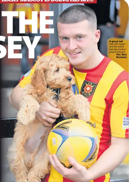  ?? Pic: Ben Kearney ?? A great tail Kyle with Jasper and the match ball after his four goals for Rovers