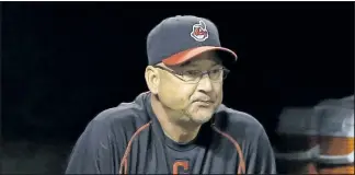  ?? TONY DEJAK/AP ?? Cleveland manager Terry Francona watches as his team beats Kansas City 8-3 on Monday. After a slow start to the season, Cleveland now finds itself battling for a playoff spot.