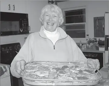  ?? Courtesy of Carol McKinley ?? Anne McKinley battles a host of health issues and, four years ago, lost her husband after 59 years of marriage. Yet she remains positive, active and thrives on time spent with family and friends. Baking and eating cookies with her grandchild­ren is a...