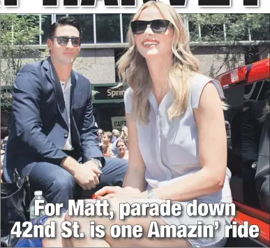  ?? Chad Rachman ?? ALONG FOR THE RIDE: Matt Harvey, last night’s All-Star Game starter for the National League, rides in yesterday’s parade with his supermodel girlfriend, Anne V.