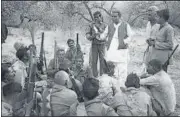  ?? HT ARCHIVE ?? Over 200 dacoits surrendere­d in Dhorera in April 1972.