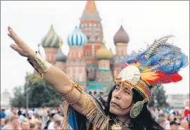  ?? Felipe Trueba EPA/Shuttersto­ck ?? ST. BASIL’S CATHEDRAL provides a backdrop to a man in Peruvian costume. Red Square has felt like the center of the World Cup since the tournament began.
