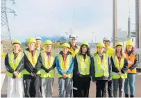  ?? PHOTOS / ALYSSA SMITH ?? Secondary school students from Stratford High School and Te Paepae o Aotea, pictured with site staff and representa­tives from Contact Energy and Connexis, visited Stratford Power Station on Thursday, June 20.