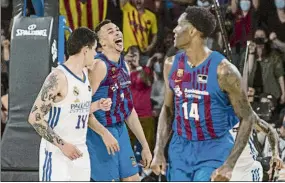  ?? FOTO: PERE PUNTÍ ?? Dante Exum y Nigel Hayes-Davis, durante un partido contra el Real Madrid