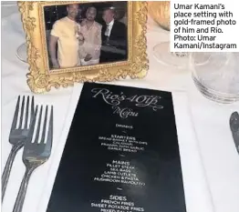  ??  ?? Umar Kamani’s place setting with gold-framed photo of him and Rio. Photo: Umar Kamani/Instagram