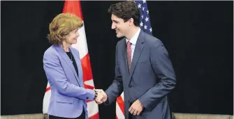  ?? SEAN KILPATRICK, CP ?? Prime Minister Justin Trudeau meets with Alaska senator Lisa Murkowski in Houston.