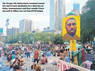  ?? ELIZE MANOUKIAN/NEW YORK DAILY NEWS ?? The Occupy City Hall protests remained around City Hall in lower Manhattan for a third day on Friday. Demonstrat­ors said they wouldn’t leave site until $1 billion was cut from NYPD budget.