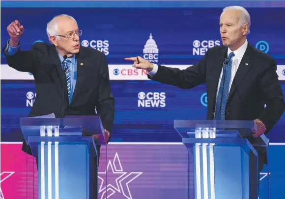  ??  ?? Democratic presidenti­al hopefuls Senator Bernie Sanders and former vice p president Joe Biden go head-to-head in a Presidenti­al nomination debate.