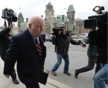  ?? SEAN KILPATRICK/THE CANADIAN PRESS ?? Sen. Mike Duffy returns to Parliament­Hill on Monday. It was the first day back for the Independen­t senator who last month was cleared of all criminal charges including fraud, bribery and breach of trust.