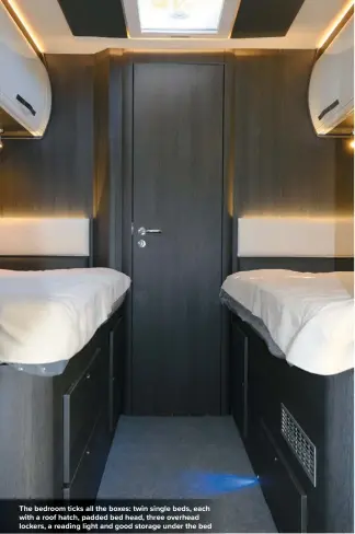  ??  ?? The bedroom ticks all the boxes: twin single beds, each with a roof hatch, padded bed head, three overhead lockers, a reading light and good storage under the bed