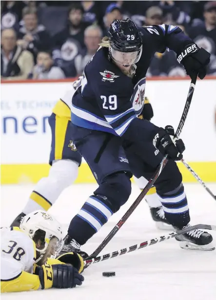 ?? TREVOR HAGAN/THE CANADIAN PRESS ?? Winnipeg Jets forward Patrik Laine has dispelled any fears of a sophomore jinx, scoring 43 goals so far this season, just two back of the league lead heading into Friday’s action.