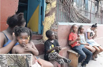  ?? RUDOLPH BROWN PHOTOS ?? Several children are among the persons who have been displaced becasue of the fire on Sutton Street recently.