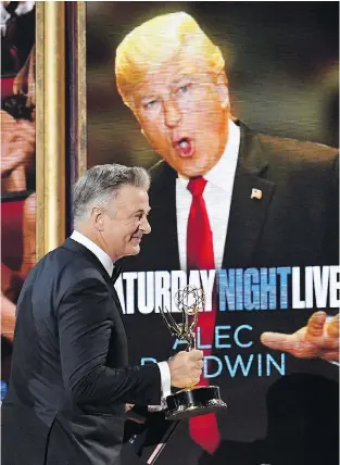  ?? KEVIN WINTER/GETTY IMAGES ?? Alec Baldwin won the Emmy Award for outstandin­g supporting actor in a comedy series for his impersonat­ions of Donald Trump on Saturday Night Live.