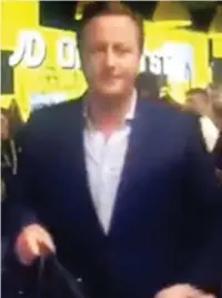  ??  ?? Pulling a fast one: David Cameron in the shop