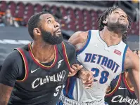  ?? DAVID LIAM KYLE GETTY IMAGES ?? Andre Drummond, left, battling Isaiah Stewart, is on the trade block in Cleveland. He’s averaging 13.5 rebounds a game.