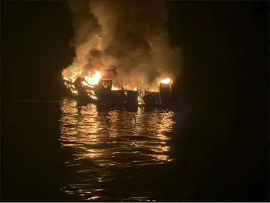  ?? HOGP ?? FILE - In this Sept. 2, 2019, file photo, provided by the Santa Barbara County Fire Department, a dive boat is engulfed in flames after a deadly fire broke out aboard the commercial scuba diving vessel off the Southern California Coast. The owners of the dive boat where 34people perished in a fire off the coast of Southern California filed a legal action in federal court Thursday, Sept. 5, 2019, to head off potentiall­y costly lawsuits. Truth Aquatics Inc., which owned the Conception, filed the action in Los Angeles under a pre-Civil War provision of maritime law that allows it to limit its liability.