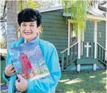  ?? MARTIN E. COMAS/STAFF ?? Longtime Slavia resident Judith Duda is the town’s unofficial historian, and she recently co-authored a book that details the community’s past.