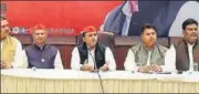  ?? HT PHOTO ?? Samajwadi Party (SP) national president Akhilesh Yadav and others at a press conference in Kanpur on Monday.
