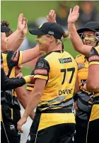  ?? GETTY IMAGES ?? Celebratio­ns begin for the Firebirds and Blaze players at the Basin Reserve yesterday after title triumphs.