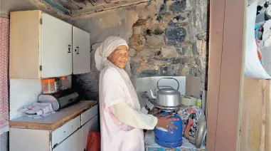  ?? PICTURE: JEFFREY ABRAHAMS ?? NEGLECTED: Latiefa Fagodien in her council-owned home in Bo-Kaap. Although she pays (nominal) rent of R10.60, the house has not been maintained for years and the historic building is crumbling.